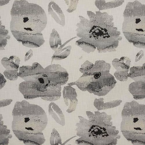 Pale grey floral cotton fabric with soft blurred blooms and charcoal accents