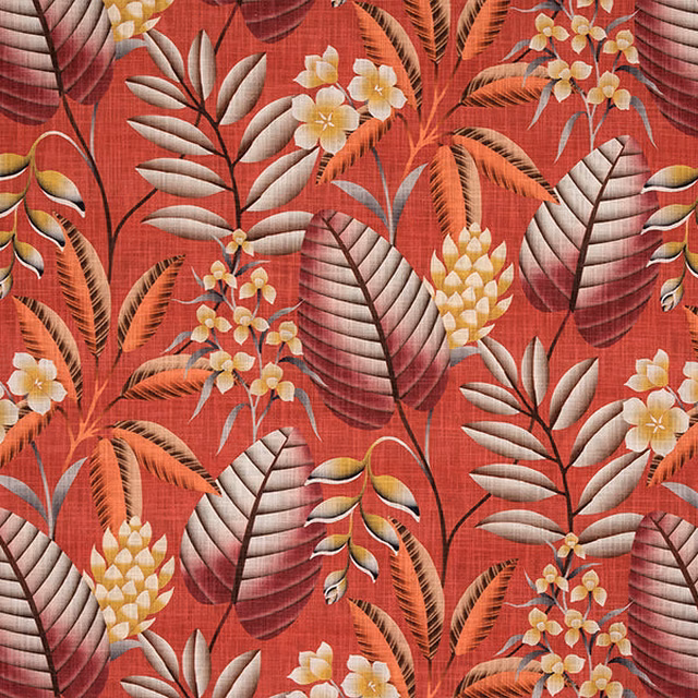Burnt orange tropical botanical fabric with large layered leaves and cream flowers