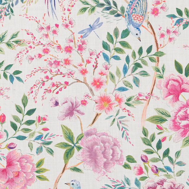Painterly floral cotton fabric with fuchsia blossoms, green leaves and blue birds on a white ground