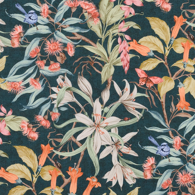 Botanical cotton print on a deep teal ground with coral, cream and green flowers