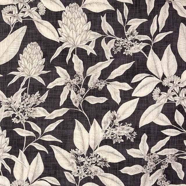 Charcoal botanical cotton fabric with large ivory leaves and flowers