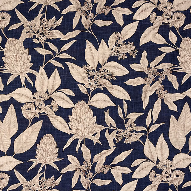 Ivory leafy botanical print on a deep indigo cotton fabric swatch