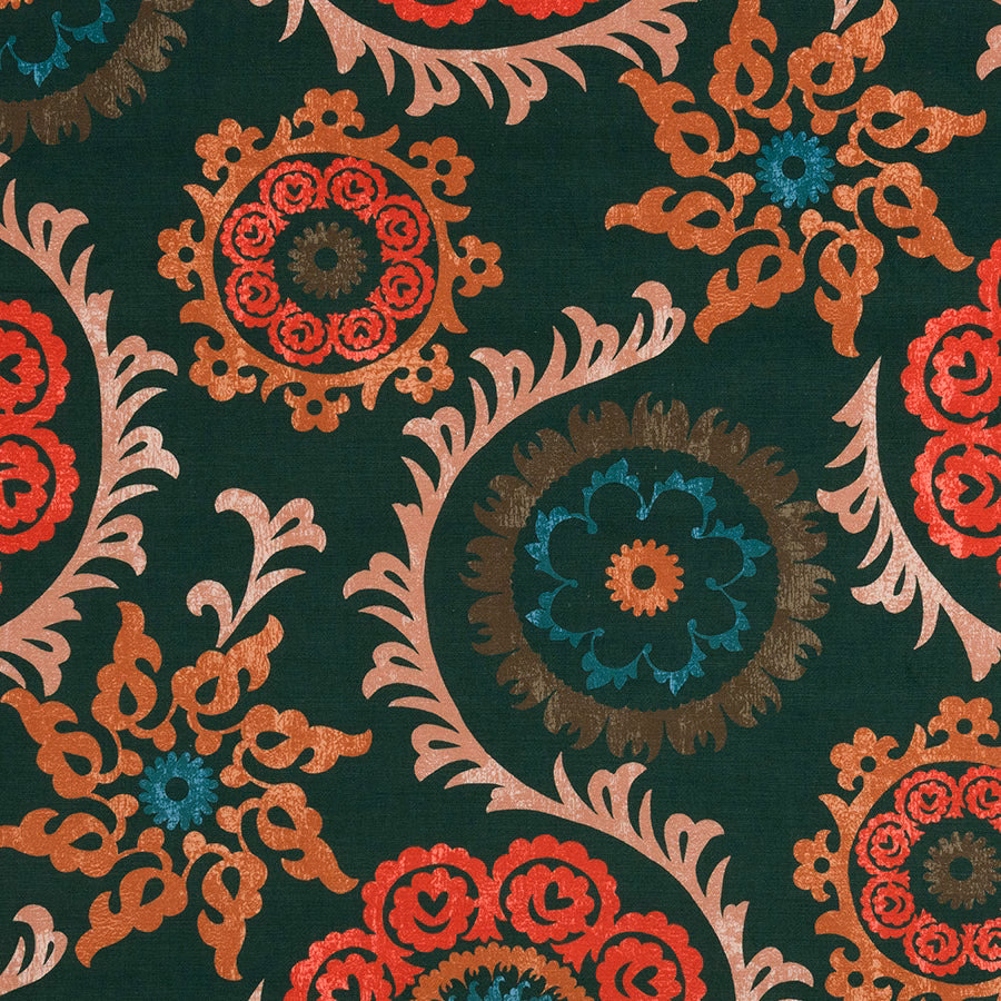 Large damask-style print on deep jade green fabric with coral, teal and blush motifs
