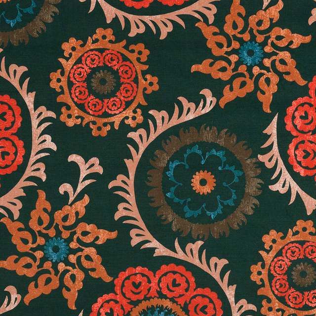 Large damask-style print on deep jade green fabric with coral, teal and blush motifs