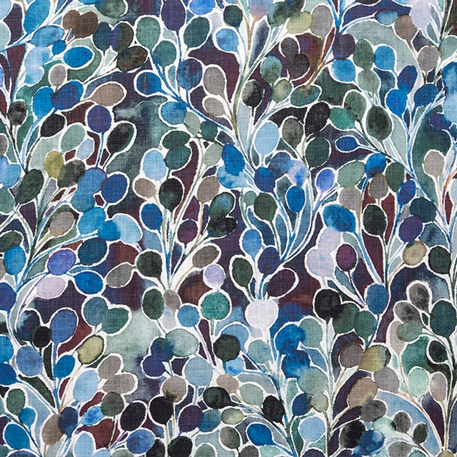 Close-up of a large botanical print in indigo, teal, green and violet on linen-textured cloth