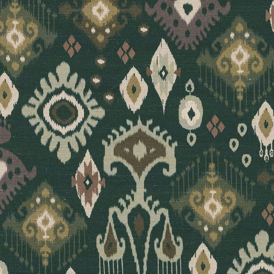Deep jade green patterned fabric with ivory and olive ikat motifs and woven texture