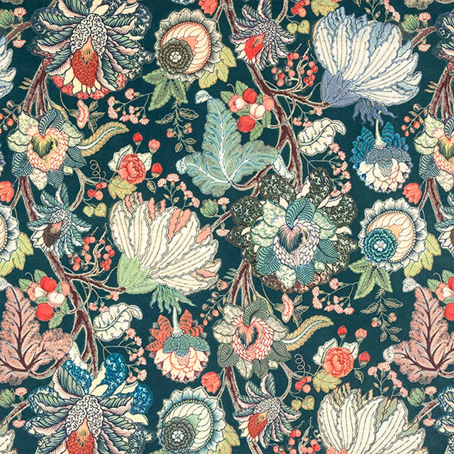Large-scale floral print on deep jade green ground with cream, aqua and coral blossoms