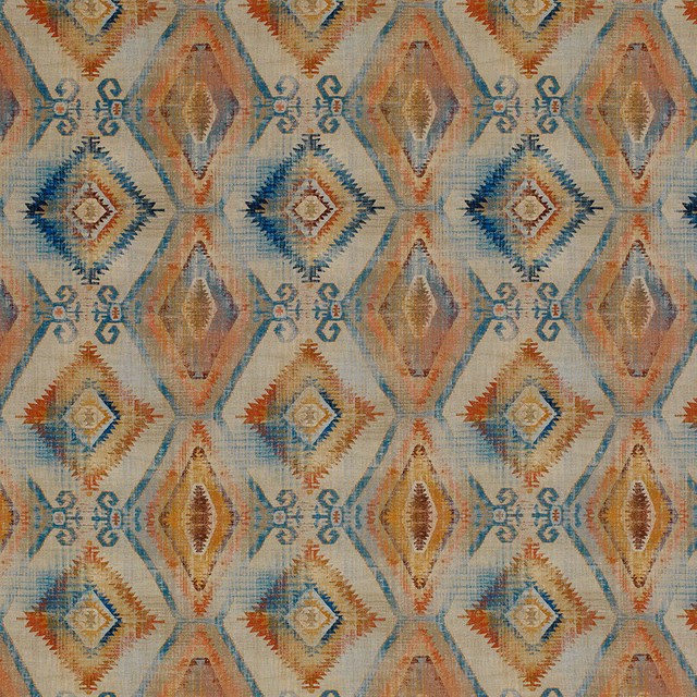Muted teal and terracotta geometric ikat-style fabric on a beige ground