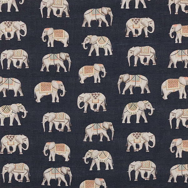 Patterned cotton fabric with ivory elephants on a deep navy ground