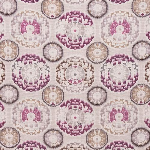 Swatch of Timor Heather showing circular medallion motifs in plum, mauve and beige on a cream ground