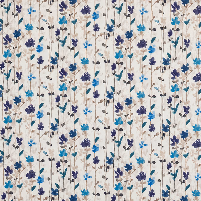 Painterly indigo and teal floral sprigs on an ivory cotton ground