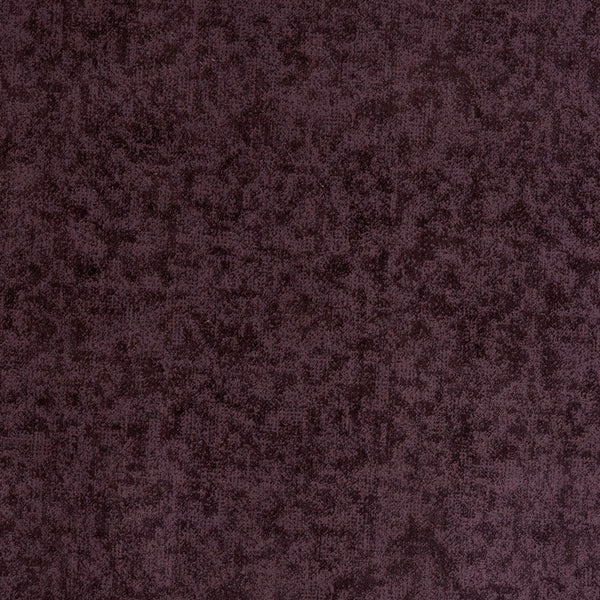 Close-up of a deep plum-lavender mottled fabric with a soft textured surface