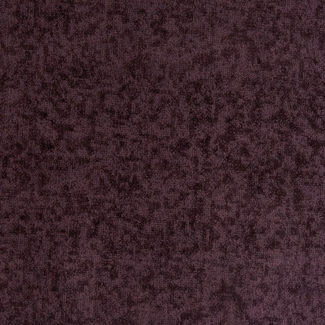 Close-up of a deep plum-lavender mottled fabric with a soft textured surface