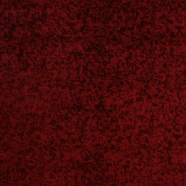Deep ruby red velvety fabric with dark shadowed texture