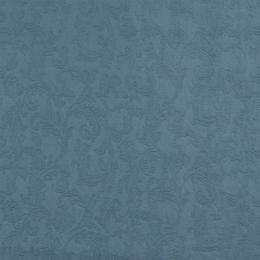 Blue jacquard fabric with raised floral damask pattern and soft texture