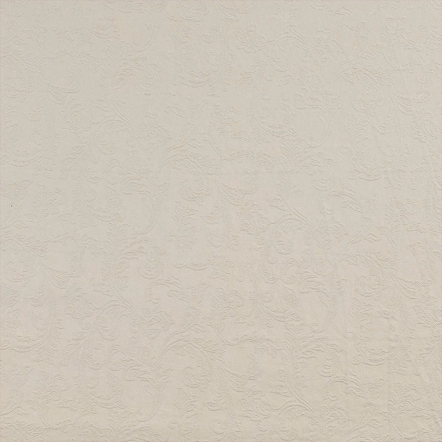 Soft putty cream textured fabric with a subtle scrolling tonal pattern