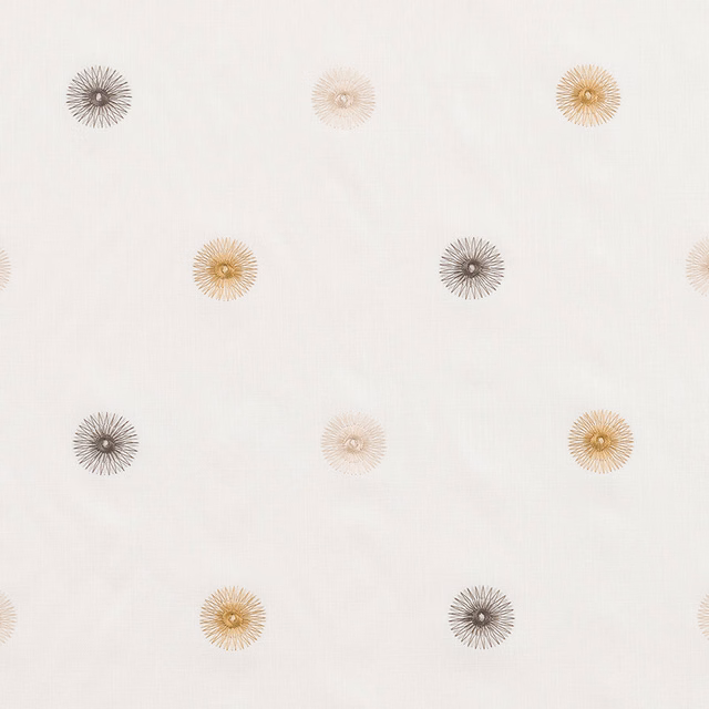Ivory fabric with scattered taupe and gold starburst motifs