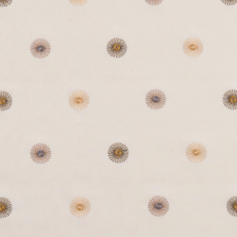 Cream fabric with small scattered embroidered floral rosettes in gold, taupe and blue