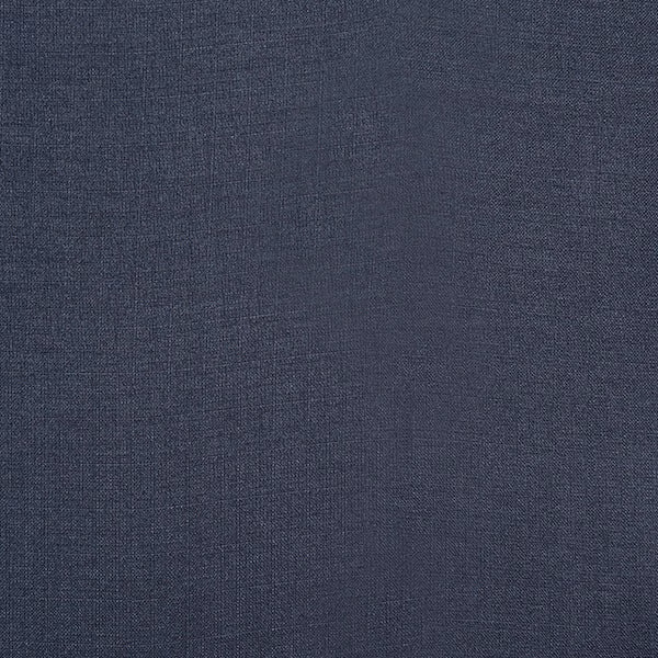 Close-up of a deep indigo plain woven fabric with fine texture