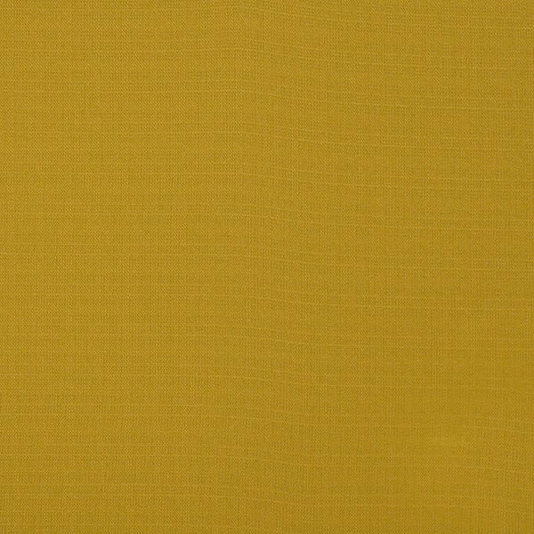 Close-up of muted ochre yellow plain-woven fabric with fine texture