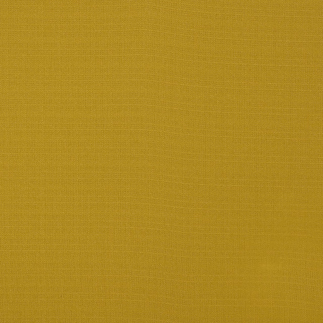 Close-up of muted ochre yellow plain-woven fabric with fine texture
