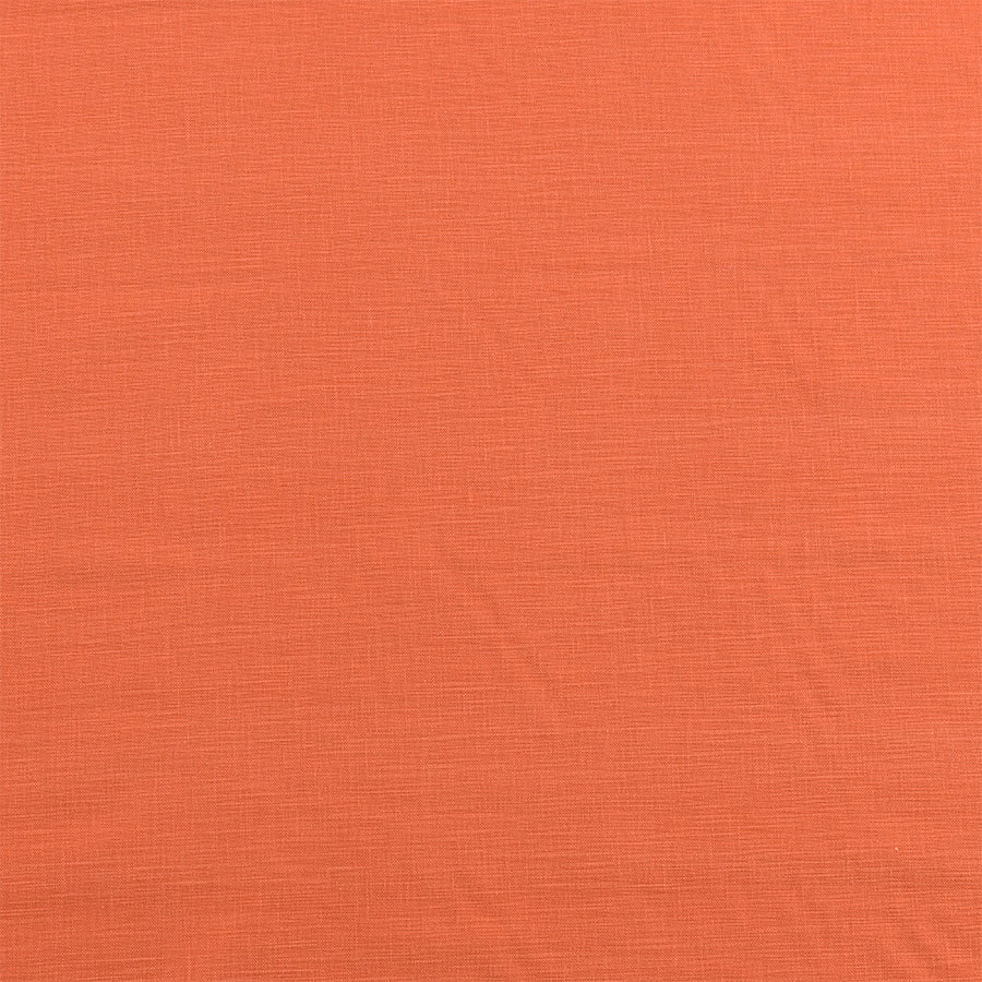 Plain burnt orange cotton fabric with a fine slubbed weave