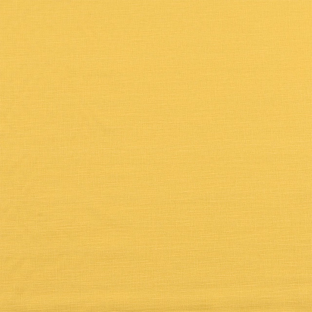 Plain soft butter-gold cotton fabric with a smooth matte weave