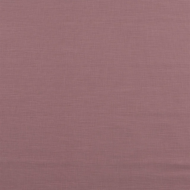 Muted heather pink cotton fabric with a fine linen-like woven texture
