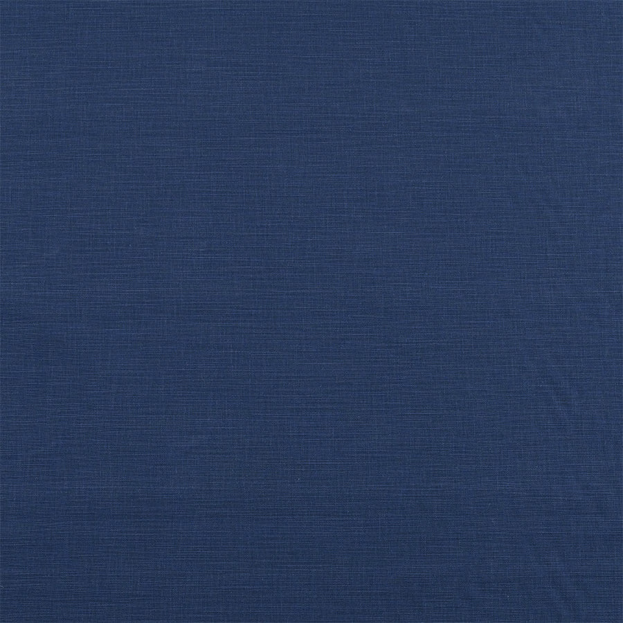 Deep indigo plain cotton fabric with fine woven texture