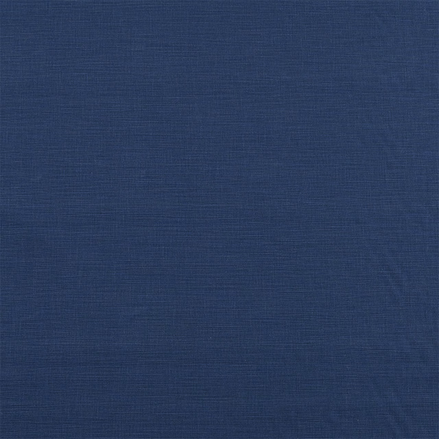 Deep indigo plain cotton fabric with fine woven texture