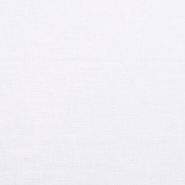 Plain soft white cotton fabric with fine woven texture