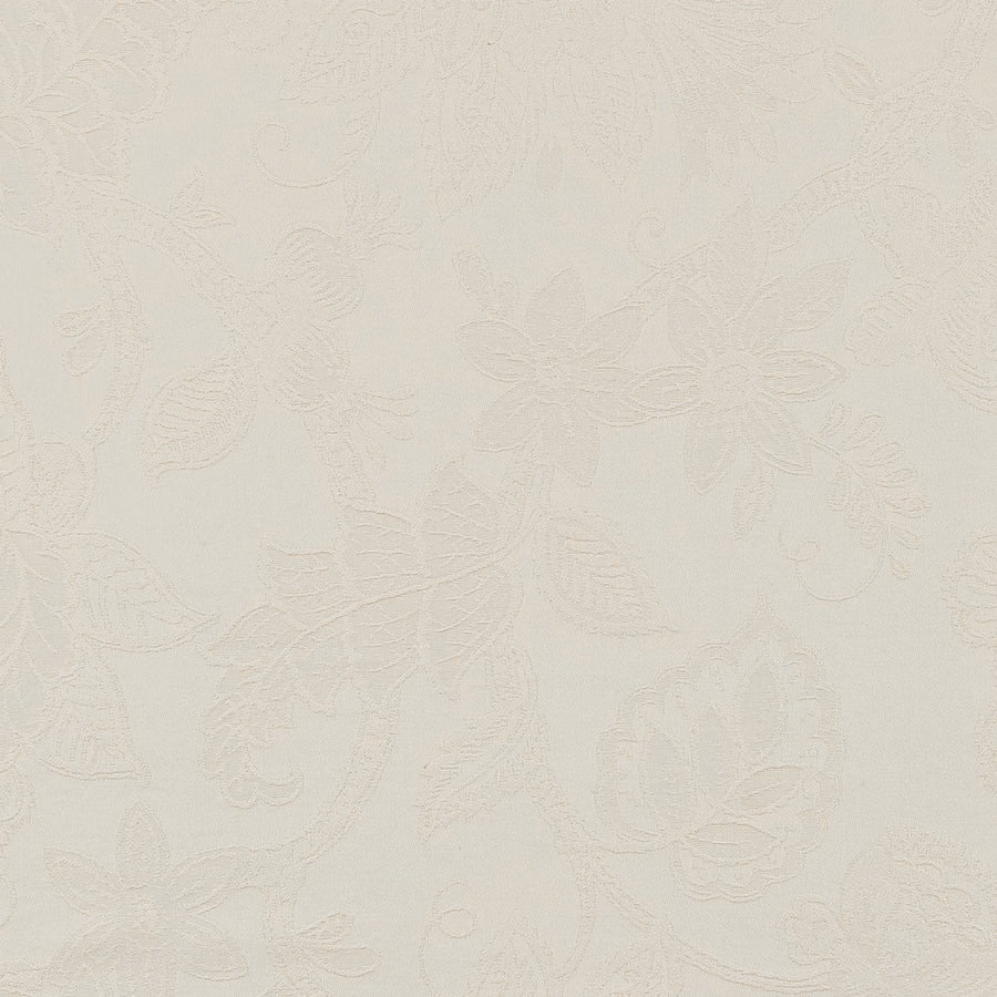 Pale ivory textured fabric with subtle raised floral pattern