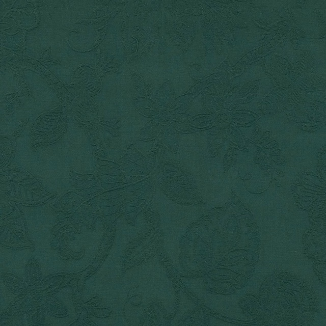 Deep jade green abstract embossed cotton fabric with organic swirls