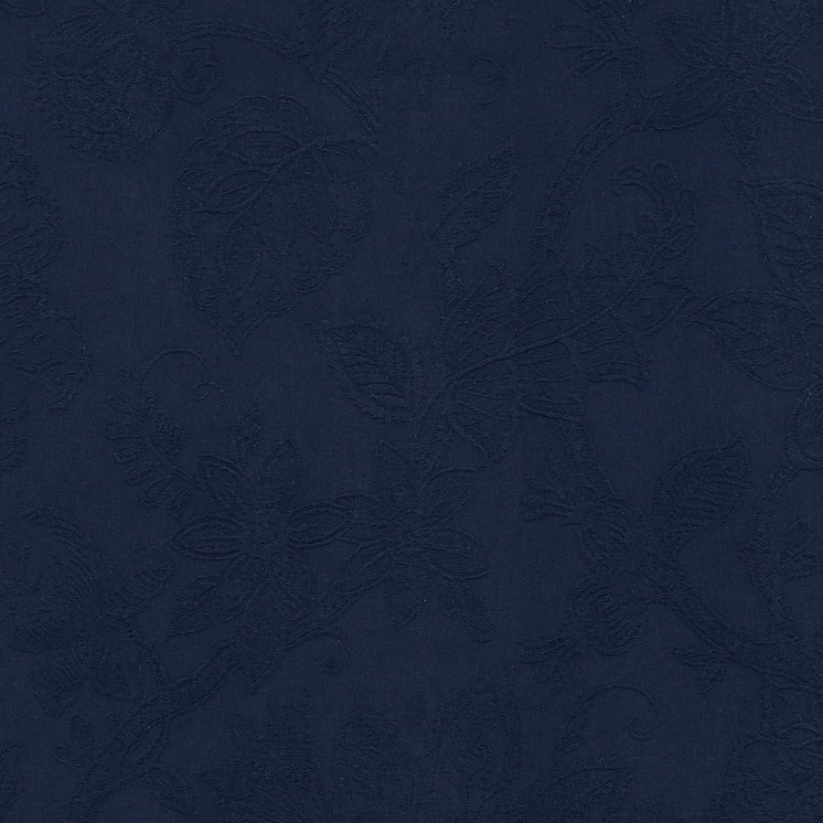 Deep navy cotton fabric with subtle raised abstract pattern