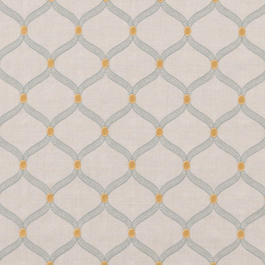 Pale seafoam geometric trellis fabric with small ochre dots on a light ground