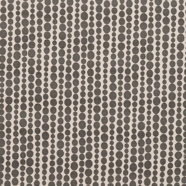 Pewter grey woven fabric with dense circular dot pattern