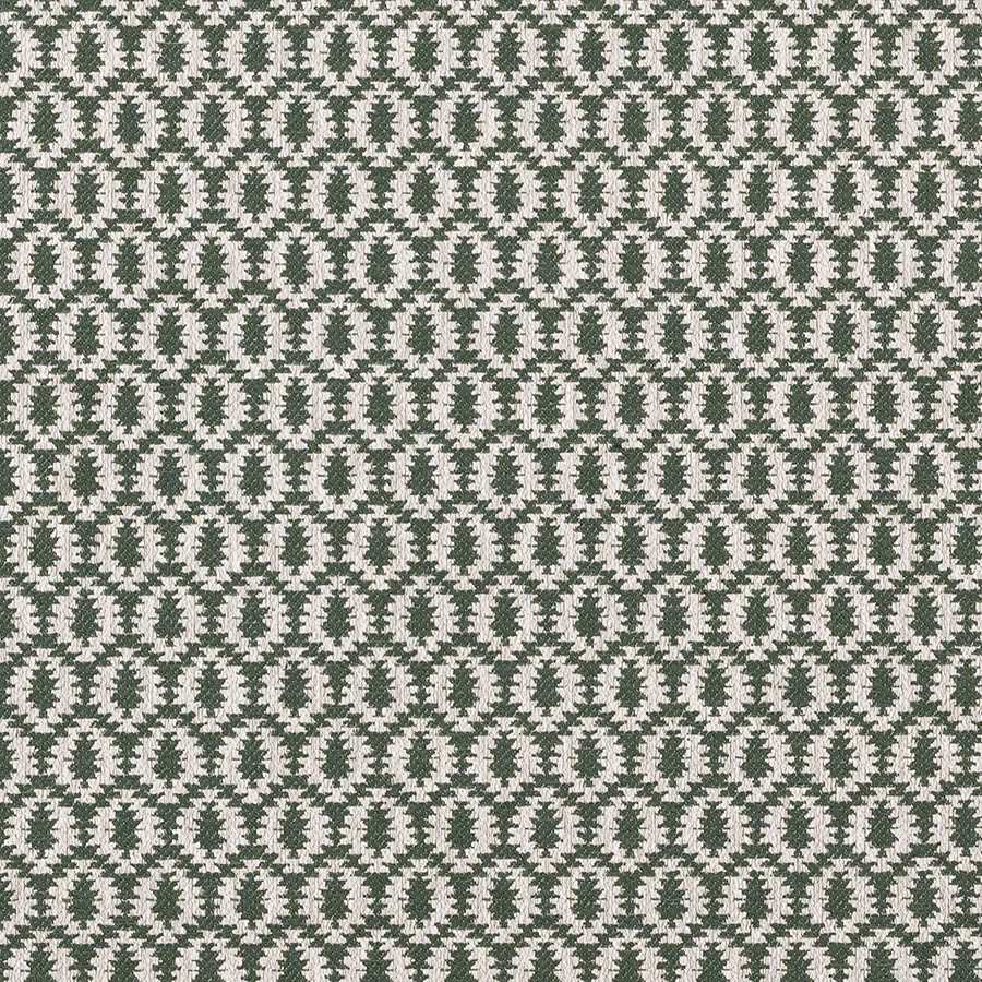 Close-up of small jade green geometric pattern on a pale woven fabric