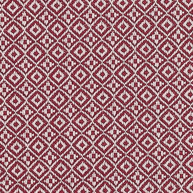 Raspberry pink-red geometric fabric with small ivory diamond pattern