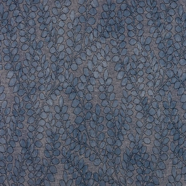 Seafoam blue botanical fabric with fine dark outlined leaf trail