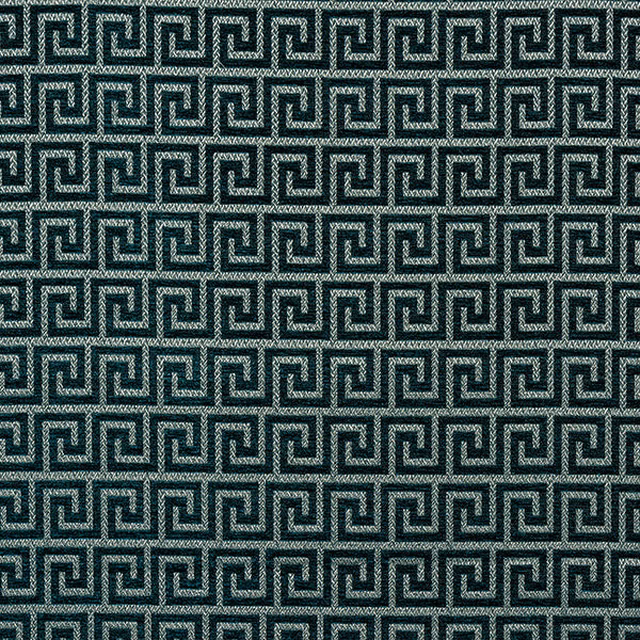 Close-up of deep teal Greek key woven fabric with small geometric repeat