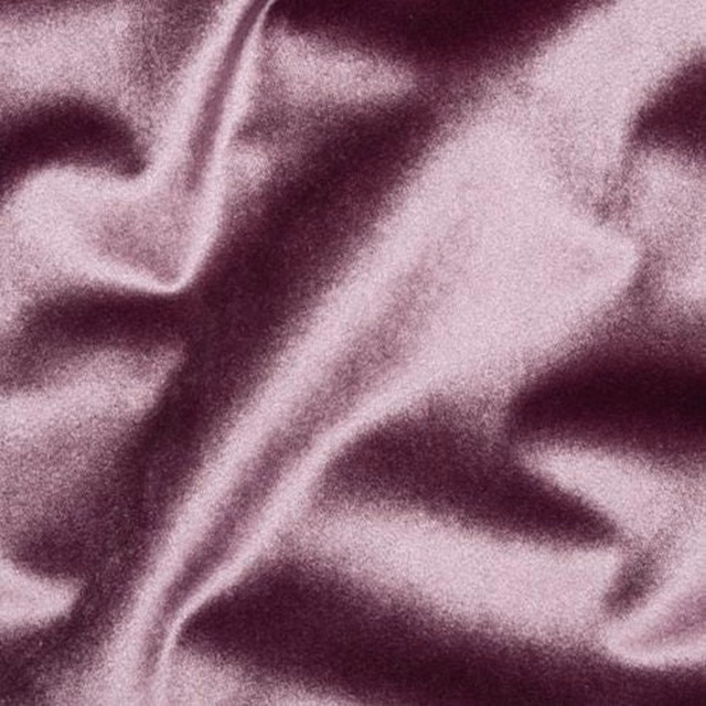 Shiny blush pink fabric with soft folds and deeper mauve shadows