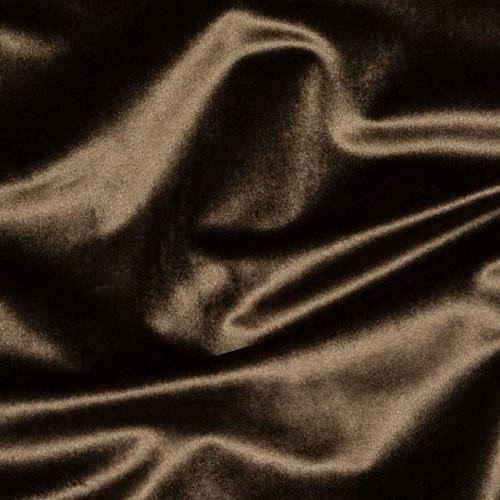 Close-up of lustrous deep chocolate brown fabric with soft folds