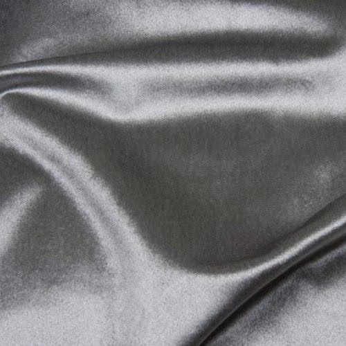 Cool dove grey satin fabric with soft rippling folds and a smooth sheen