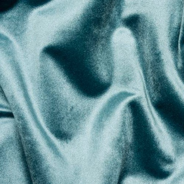 Duck egg teal fabric with a smooth satin sheen and soft draped folds