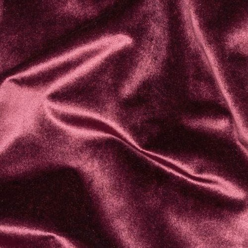 Deep grape-purple velvet fabric with glossy folds and soft sheen