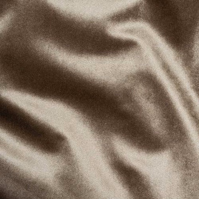 Close-up of mink taupe velour fabric with soft silky sheen