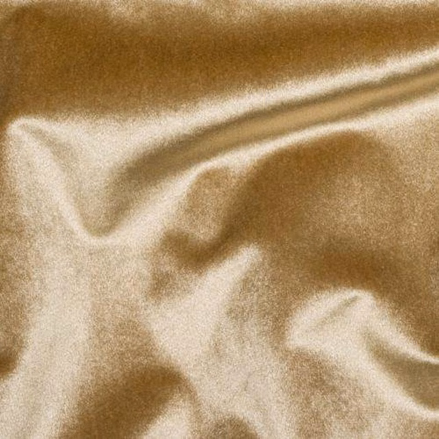 Close-up of warm mushroom beige satin-finish fabric with soft folds and sheen