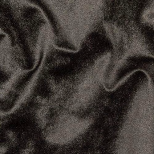 Close-up of smoky black velvet-look fabric with soft highlights and shadowed folds