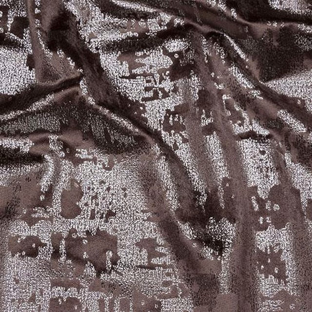 Crumpled brown and silver metallic patterned fabric with a glossy sheen