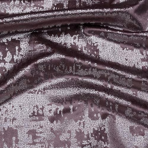 Close-up of Mercury Mauve fabric with smoky plum ground and silvery mauve abstract pattern